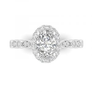 oval halo ring features over 1/2CT of diamonds with a 1/3CT center.